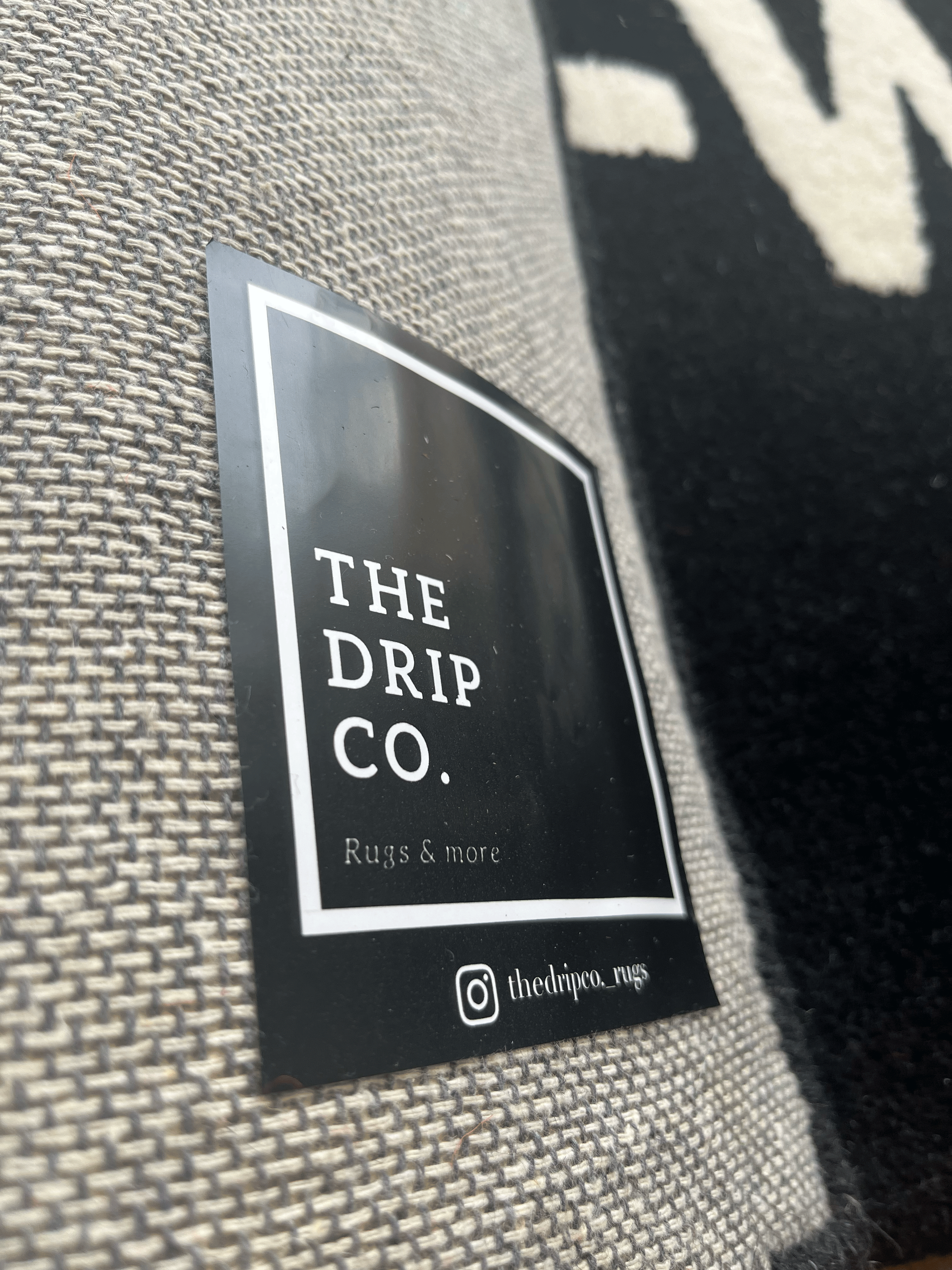 Off White text Black Rug