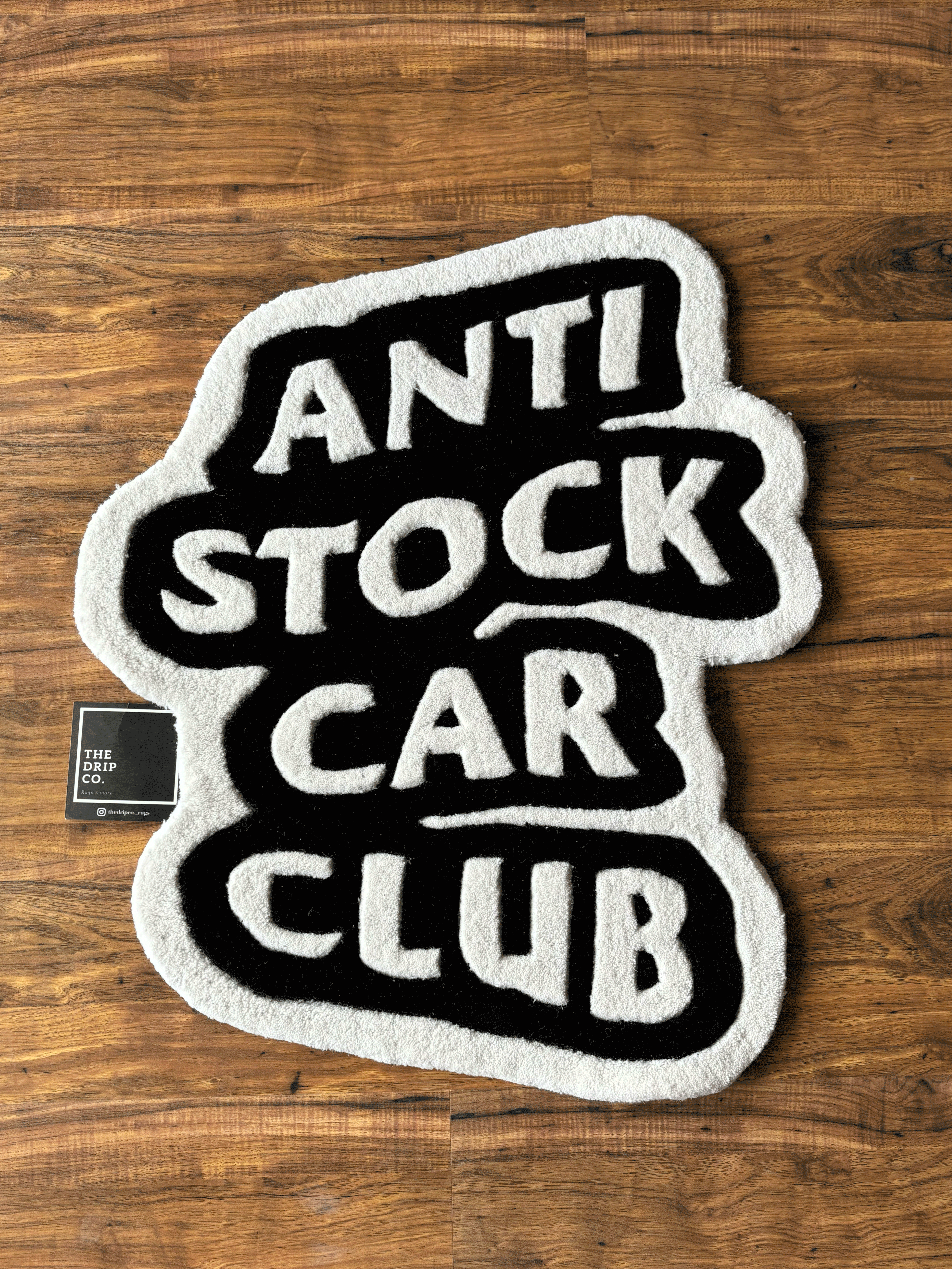 Anti Stock Car Club Hand Tufted Rug by The Drip Co.