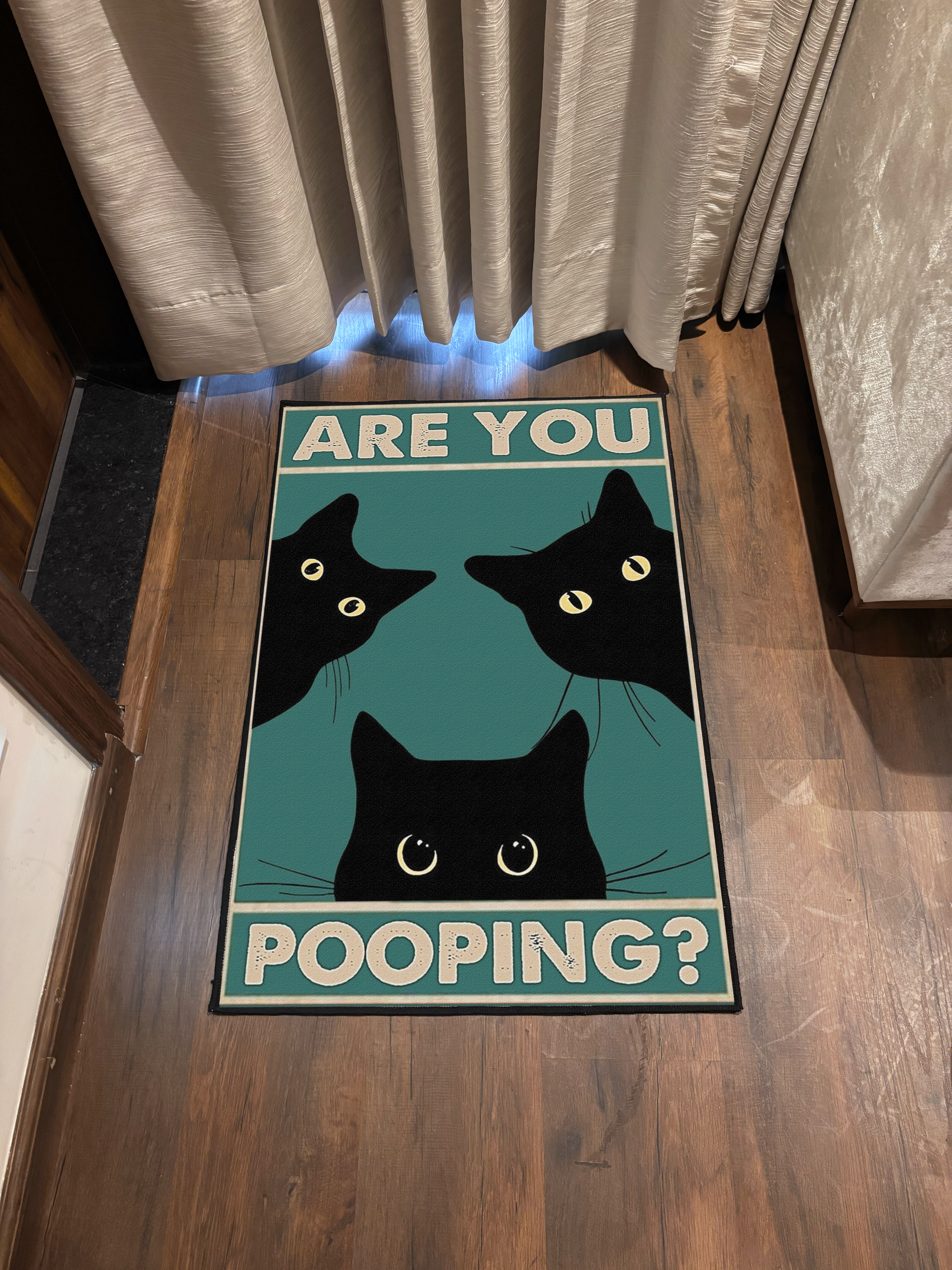 Cat Pooping Door Washable Rug by the Drip Co.