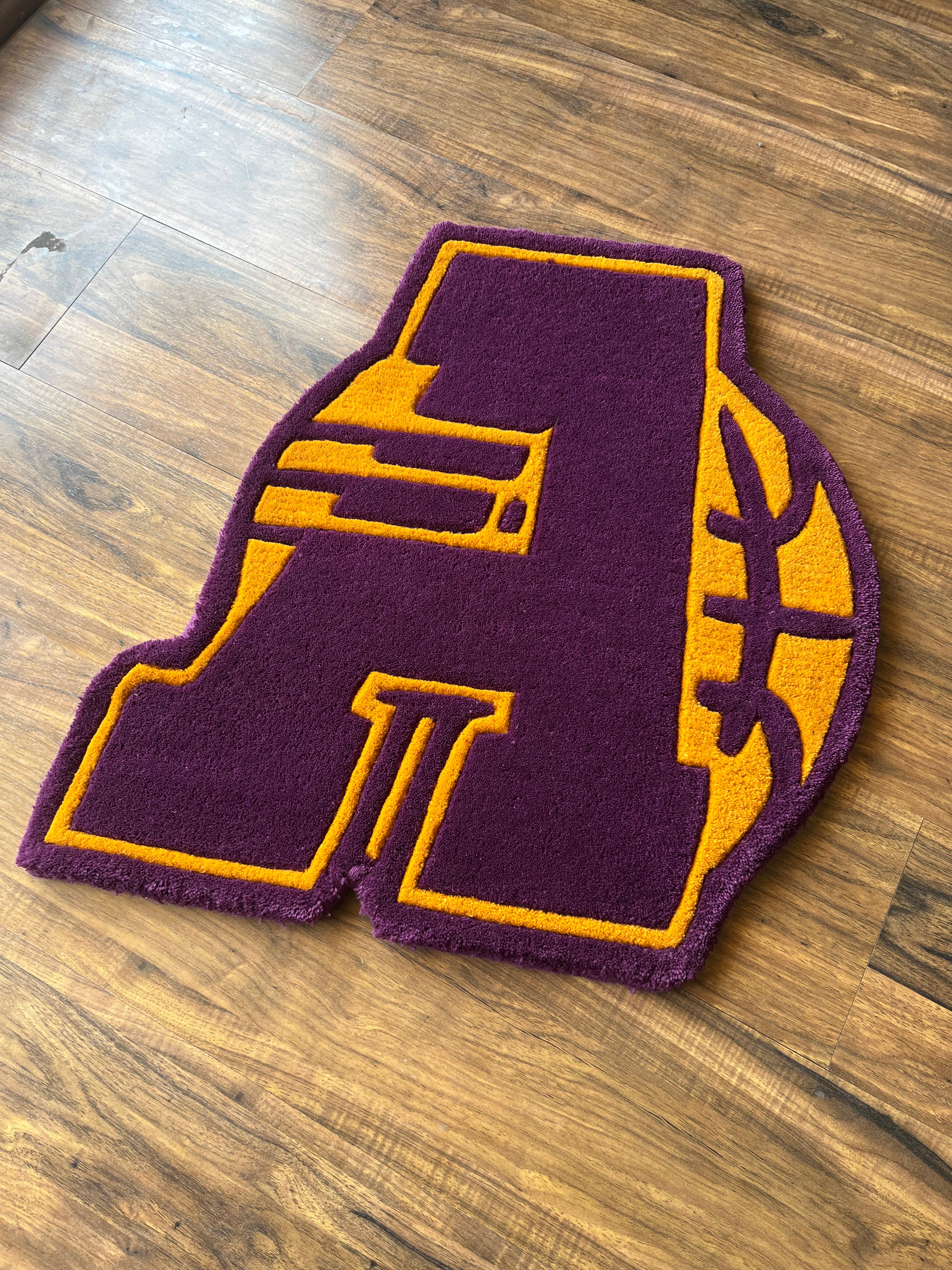 A Lakers Rug Hand Tufted Rug by The Drip Co.